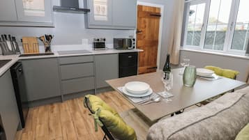 Fridge, dishwasher, toaster, cookware/dishes/utensils