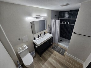 Hair dryer, towels, soap, shampoo