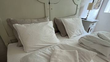 Premium bedding, pillow-top beds, minibar, individually decorated