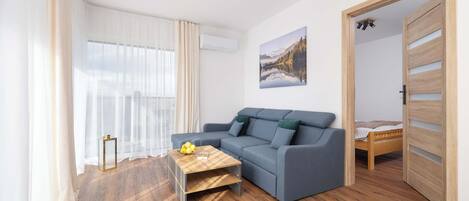 2 slaapkamers, een strijkplank/strijkijzer, reisbedje, wifi