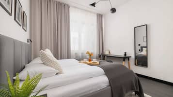 2 bedrooms, desk, iron/ironing board, travel crib