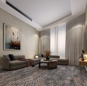 Suite Deluxe | Área de sala de estar