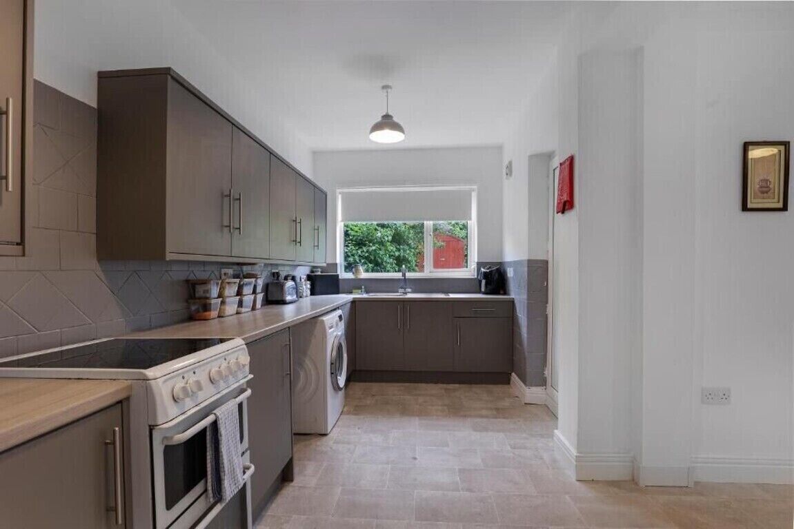 Fridge, microwave, toaster, dining tables