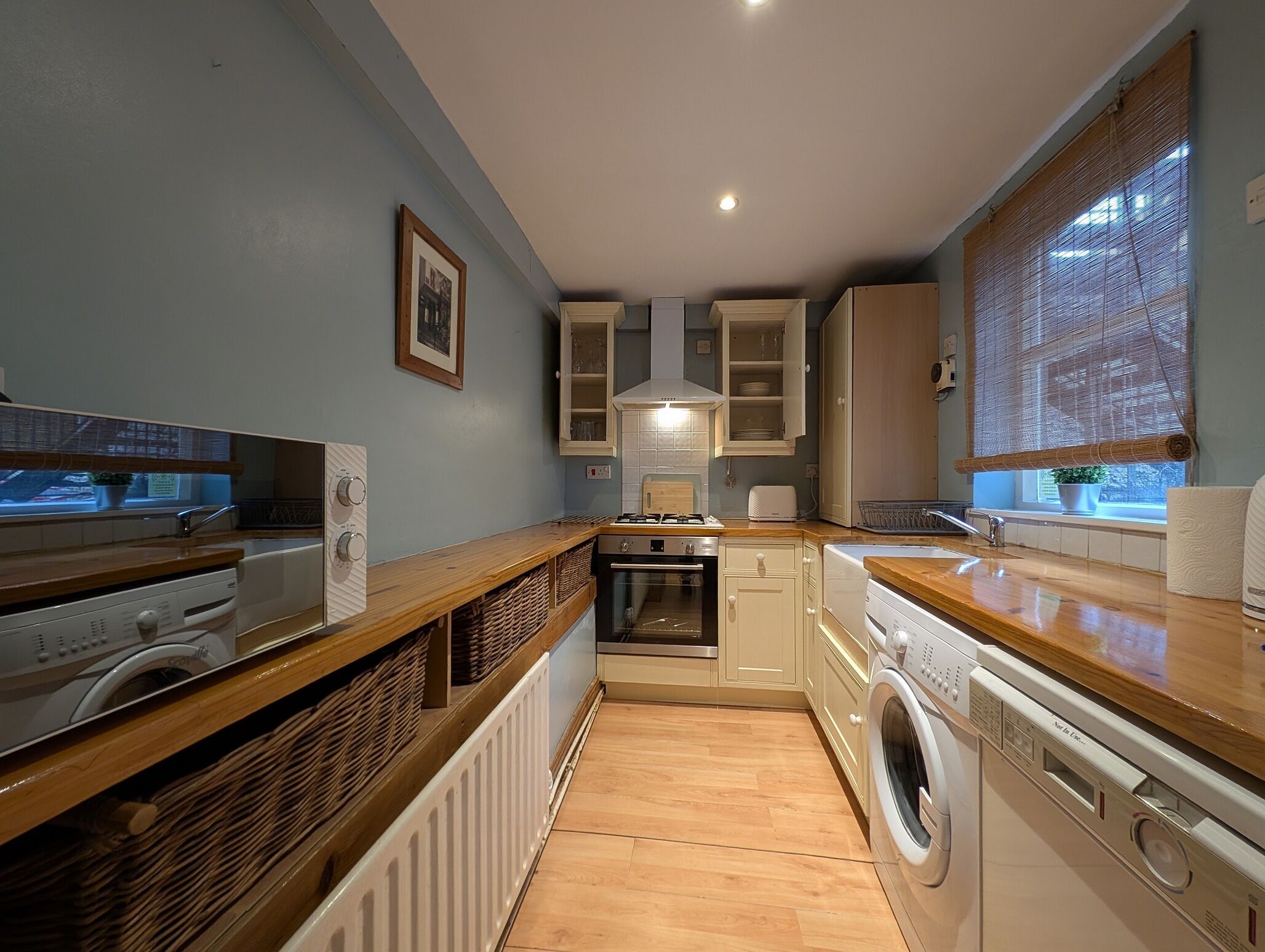 Fridge, microwave, toaster, dining tables