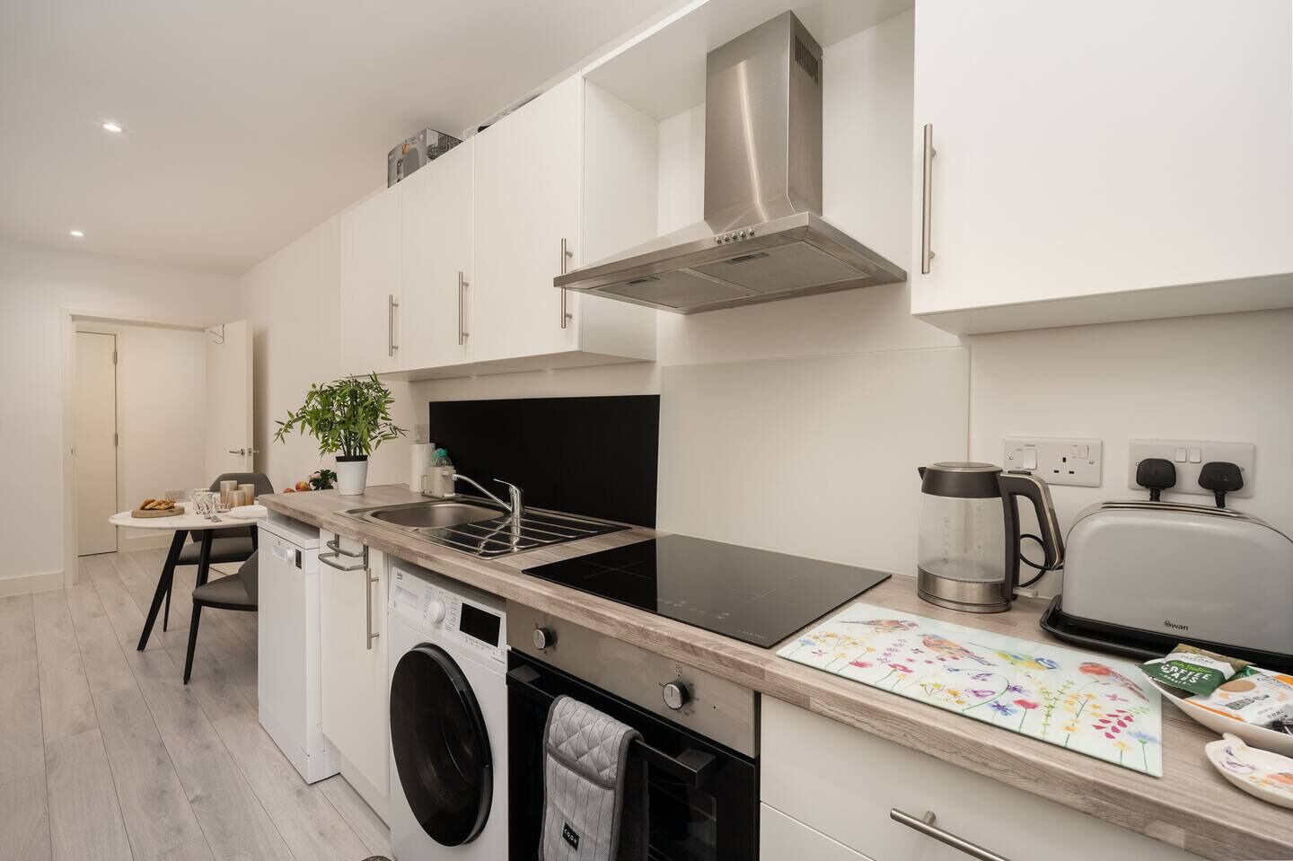 Fridge, oven, toaster, cookware/dishes/utensils