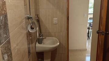 Shower, towels, soap, toilet paper