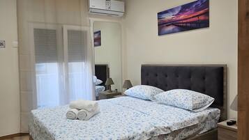 2 habitaciones, tabla de planchar con plancha, wifi y ropa de cama