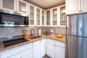 Fridge, microwave, stovetop, coffee/tea maker - 2BR • 4 Beds • by Miami SoFi Vacation Rentals <br>Tucked in a quiet Palmetto Bay neighborhood, this property offers stylish 2BR/1BA stays with thoughtful design, outdoor spaces, and easy access to parks, dining, and Miami hotspots. (Palmetto Bay)