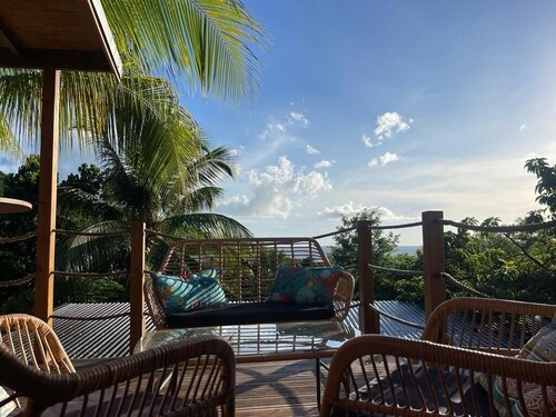 Kazakolibri small wooden chalet in the heart of nature with sea-view terrace.