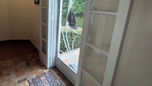 Interior - This comfortable 1BR setup features 2 queen beds + a futon, fast WiFi, and the rare perk of FREE parking. <br>A great home base for enjoying Miami, plus stay in the heart of South Beach’s coveted SoFi neighborhood—a short walk to the sand. (Miami Beach)