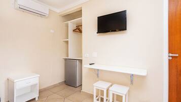 Triple Room | Living area | TV