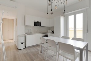 Apartment, Balcony, River View | Private kitchen | Espresso maker, electric kettle