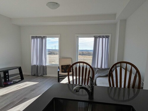 Clean, spacious 3 bedroom townhouse. Family friendly, relaxing stay free Wifi.