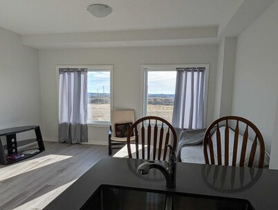 Clean, spacious 3 bedroom townhouse. Family friendly, relaxing stay free Wifi.