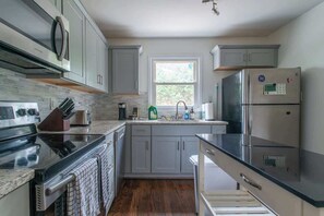 Fridge, microwave, oven, stovetop - Charming 3BR Home w/ Fenced Yard Near DT Raleigh (Raleigh)