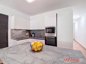Fridge, microwave, oven, stovetop - Balcony Apartment in Charming Malta Village (Ħal Għaxaq)