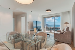 Condo Deluxe, vista al océano | Área de sala de estar