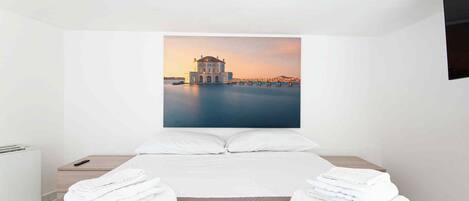 1 dormitorio, tabla de planchar con plancha, wifi y ropa de cama