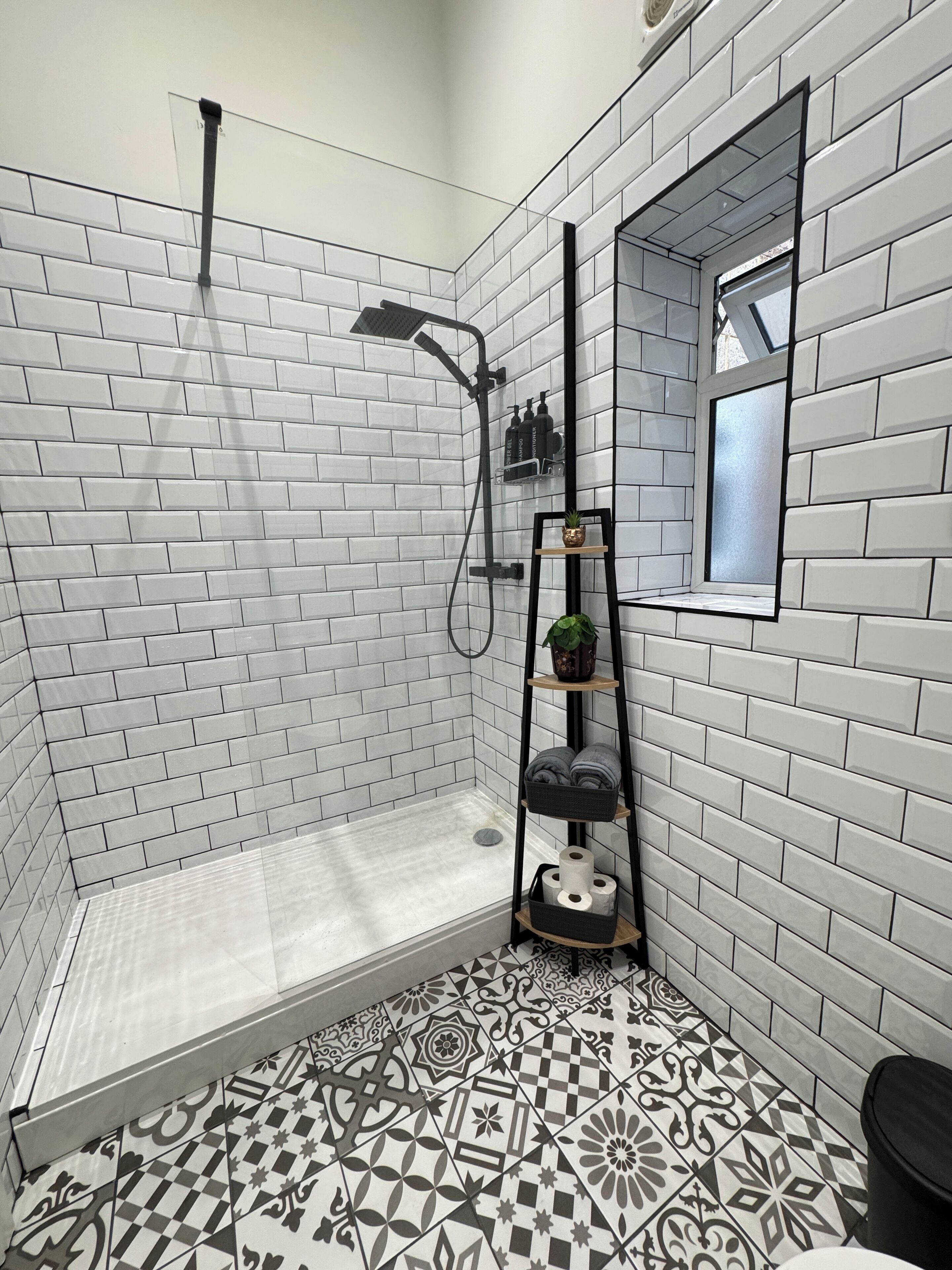 Shower, towels, soap, toilet paper