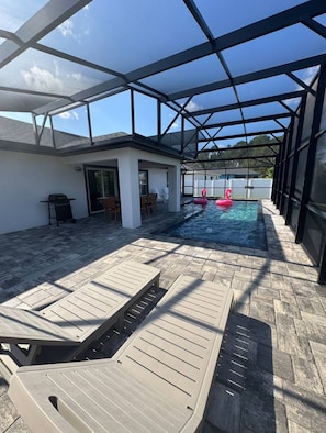 Outdoor pool, a heated pool - Stylish Palm Coast Home w/ BRAND NEW Private Heated Pool
& Tropical Haven! (Palm Coast)