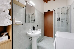 Shower, free toiletries, hair dryer, towels