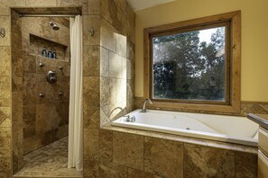 Jetted bath, hair dryer, towels, shampoo
