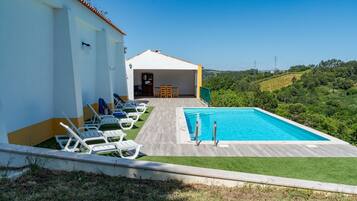 Outdoor pool, pool umbrellas, sun loungers