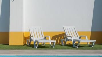 Outdoor pool, pool umbrellas, pool loungers
