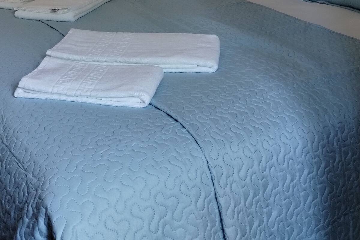 Family Studio, Air conditioning, Courtyard View | Blackout curtains, iron/ironing board (on request), rollaway beds