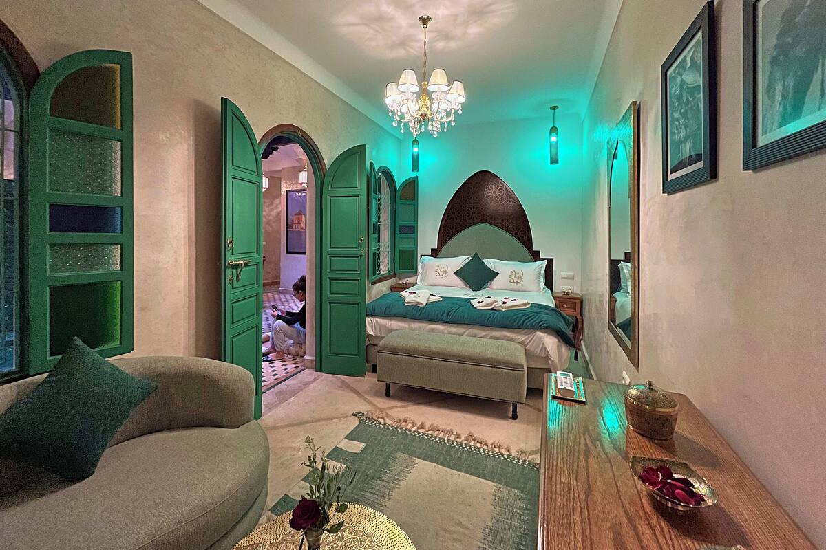 Deluxe Room, Pool View | In-room safe, iron/ironing board, free WiFi