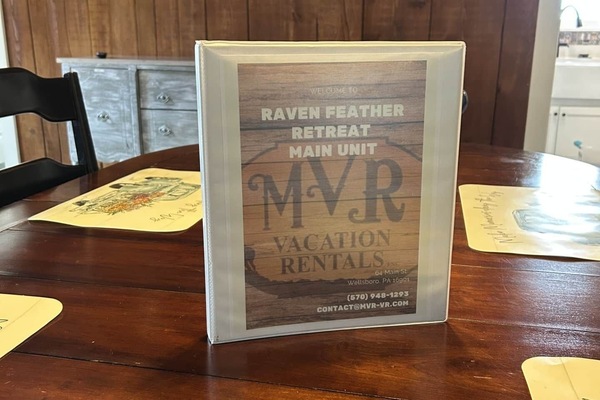 Welcome Book at entry Main Cabin