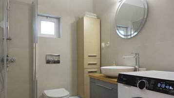 Shower, free toiletries, hair dryer, towels