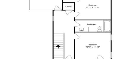 Plànol d'una planta amb un balcó, dues habitacions, un bany i un vestidor.