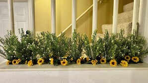 A staircase with white balusters and a yellow wall. - Cozy house in Bridgeport WV - 5 Bedrooms (Bridgeport)