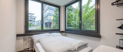 1 dormitorio, tabla de planchar con plancha, cuna de viaje y wifi