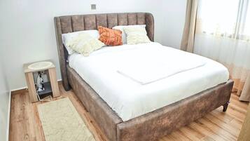 2 dormitorios, tabla de planchar con plancha, wifi gratis y ropa de cama