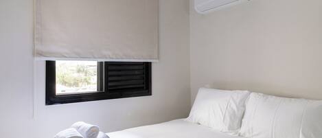 Apartment, City View | Blackout drapes, iron/ironing board, free WiFi