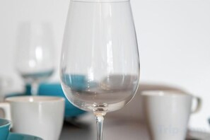 A clear glass of water on a table with a blurred background of similar items. - Urban Suite@Midhills Genting Highlands (Free WiFi) (Genting Highlands)