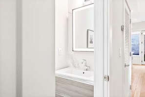 Shower, jetted bath, hair dryer, bidet