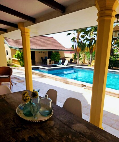 New Listing!  Pool/Garden Oasis! 3bd/2bath home w/ 2 Casitas to rent if needed!