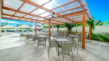Outdoor pool, open 9:00 AM to 6:00 PM, pool umbrellas, sun loungers