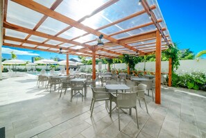 Outdoor pool, open 9:00 AM to 6:00 PM, pool umbrellas, sun loungers
