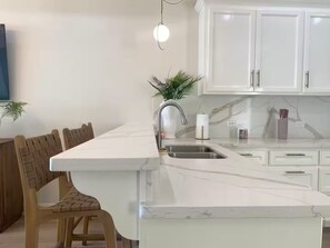 Fridge, microwave, oven, stovetop - Styles Beach 1B - Beach View Condo w/ Pool (San Pedro)