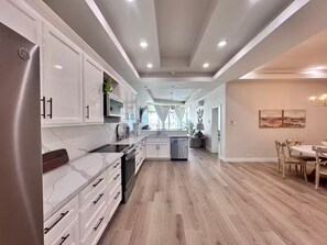 Fridge, microwave, oven, stovetop - Styles Beach 1C - 2BR Luxury Beach View Condo (San Pedro)
