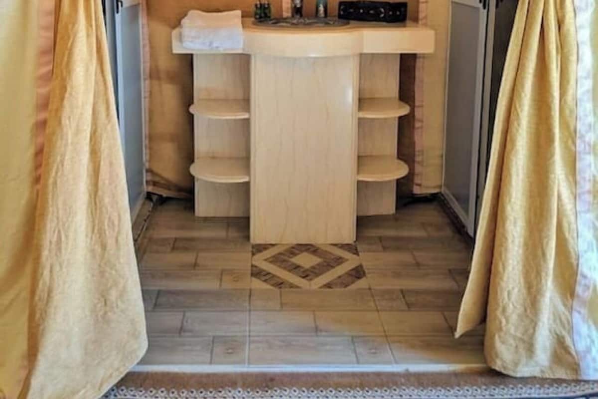 Shower, free toiletries, towels, soap