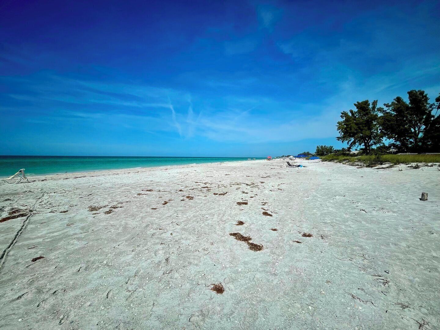 Beach nearby, sun loungers