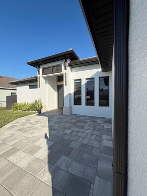 Exterior - NEW The Spectacular Sunrise Lake View, Beautiful Home with Heater Salt pool. (Cape Coral)