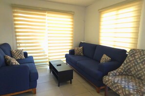 Maison supérieure, 2 chambres | Aire de séjour