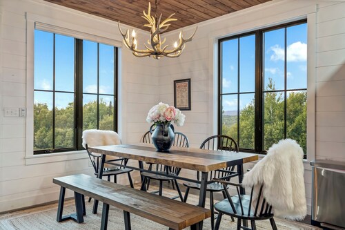 Gorgeous modern home with spectacular views in the heart of Rangeley Maine