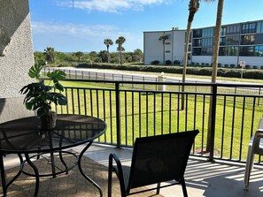 Outdoor dining - Peaceful condo in St. Augustine Beach featuring ocean views and heated pool. (St. Augustine)